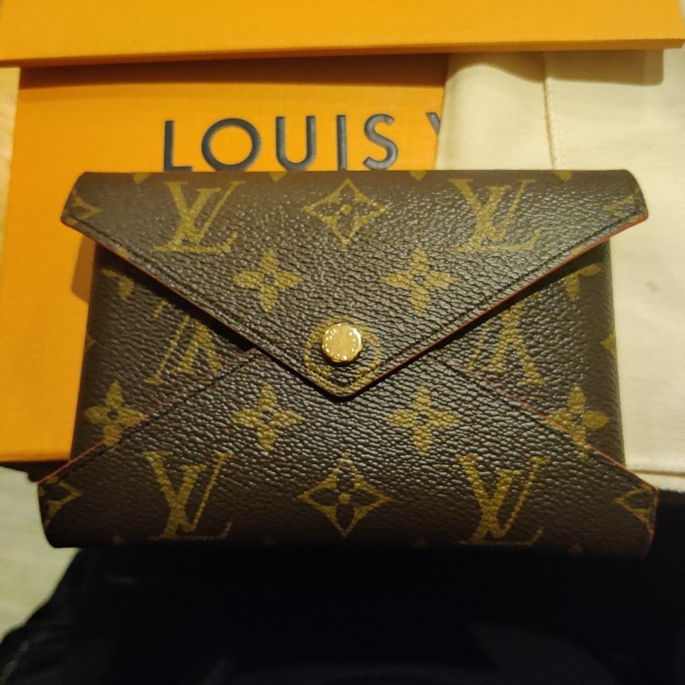 Never Used, Never Taken Out of the Box Louis Vuitton Medium Kirigami Pochette